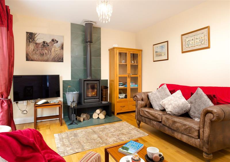 Relax in the living area at Artists Hideaway, Keswick