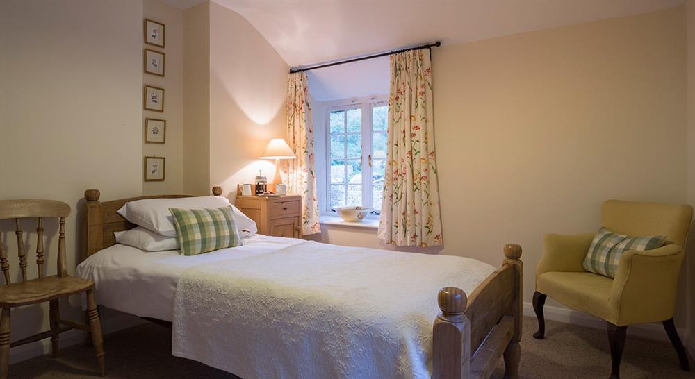 The twin bedroom at Ash Cottage in Bridport, Dorset