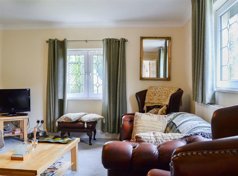 Cosy and inviting living/dining room at Ash Cottage in Llantwit Major, near Cowbridge, Glamorgan, South Glamorgan
