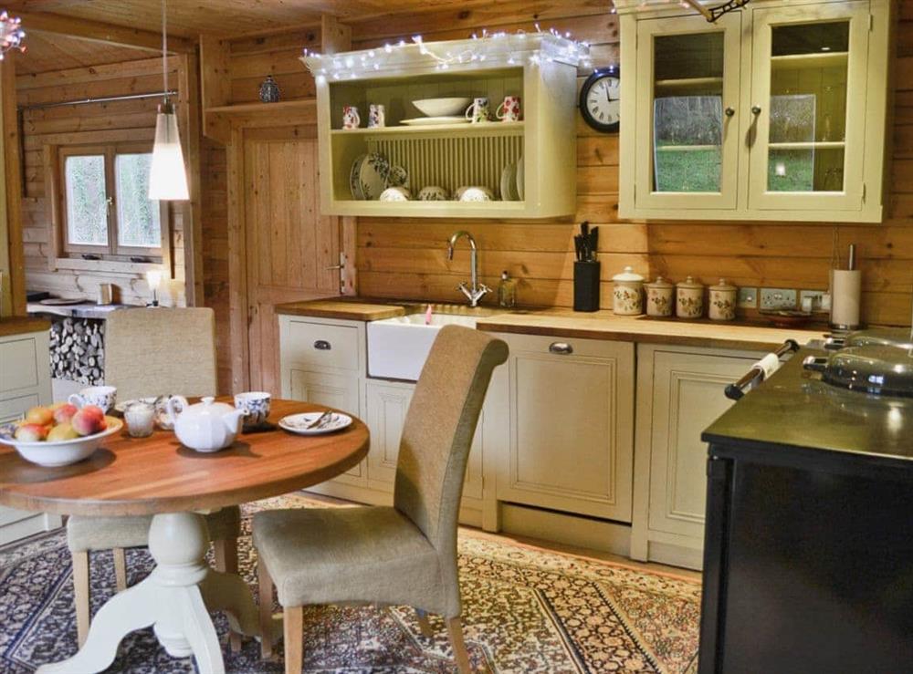 Kitchen/diner at Ash Mill Cabin in Ashreigney, near Chulmleigh, Devon