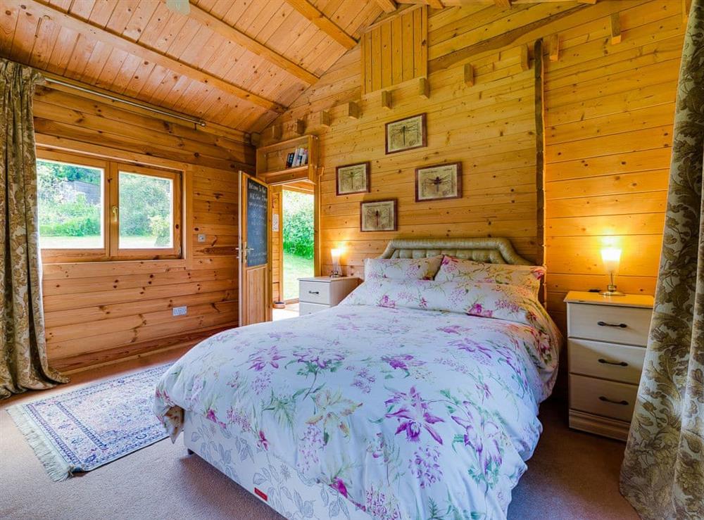 Relaxing double bedroom at Ash Mill Cabin in Ashreigney, near Chulmleigh, Devon
