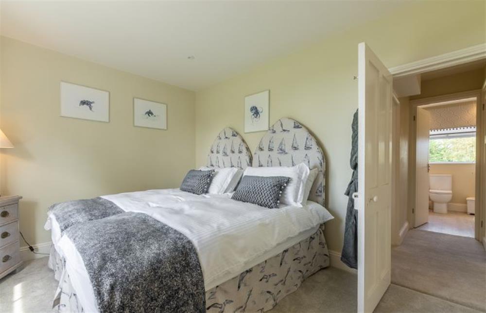 First floor: Bedroom two, with full size twin single beds at Ashdale, Thornham near Hunstanton