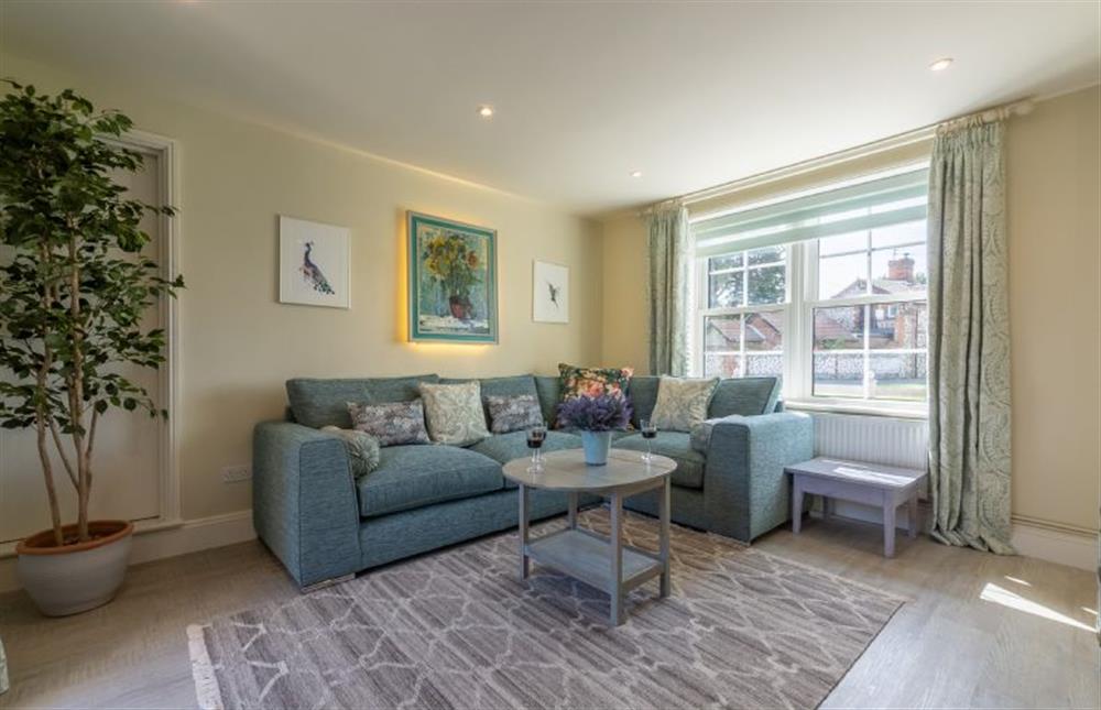 Ground floor: Duel aspect Sitting room is bright and airy