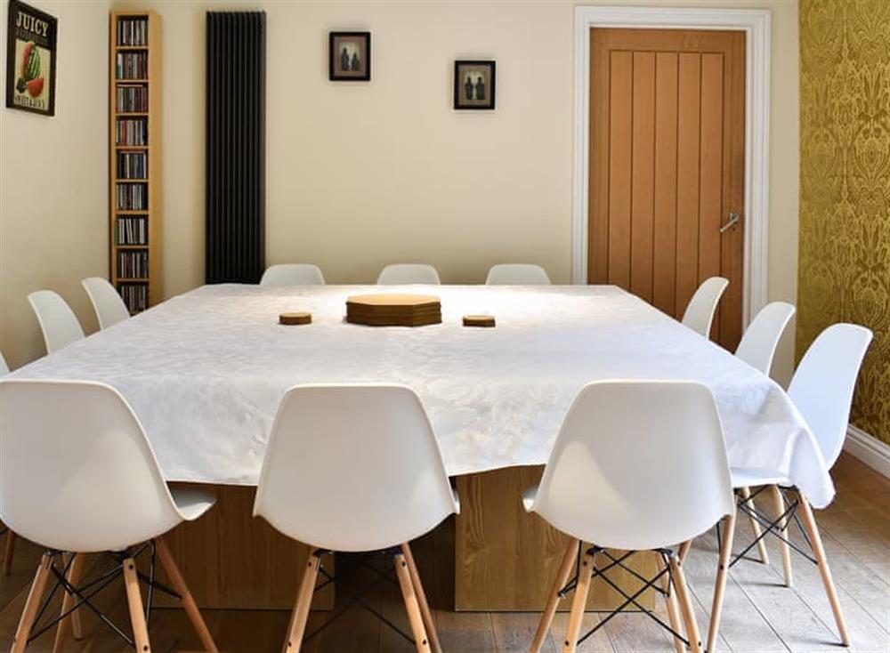 Large dining table and chairs at Ashdene Cottage in South Marston, Wiltshire