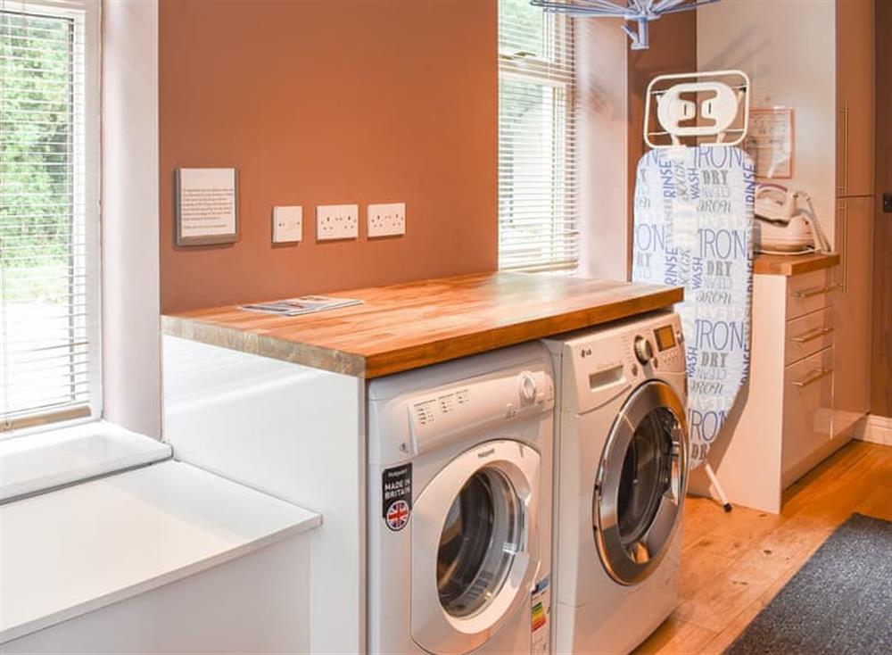 Practical utility room with laundry facilities