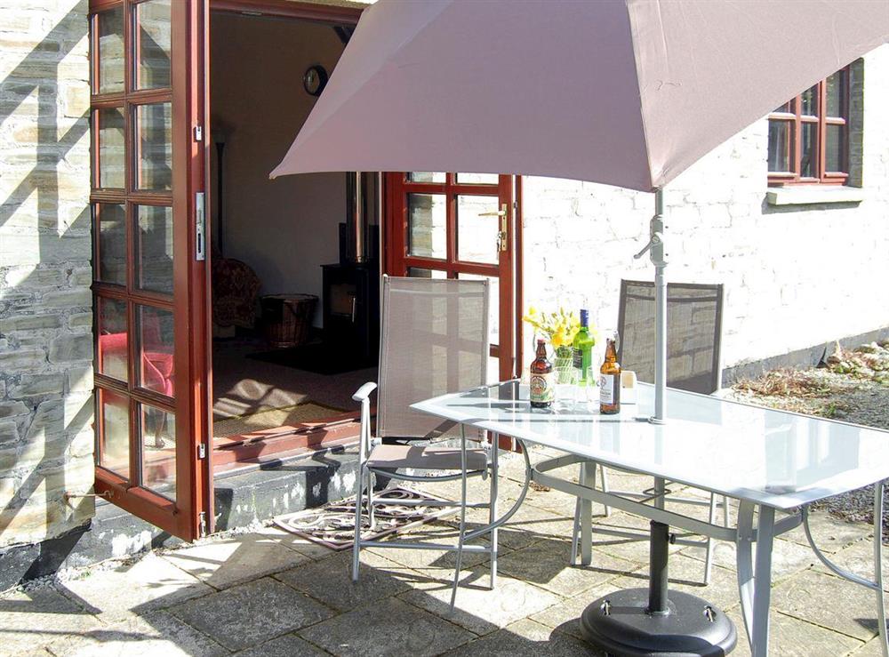 Patio with outdoor furniture at The Owl, 