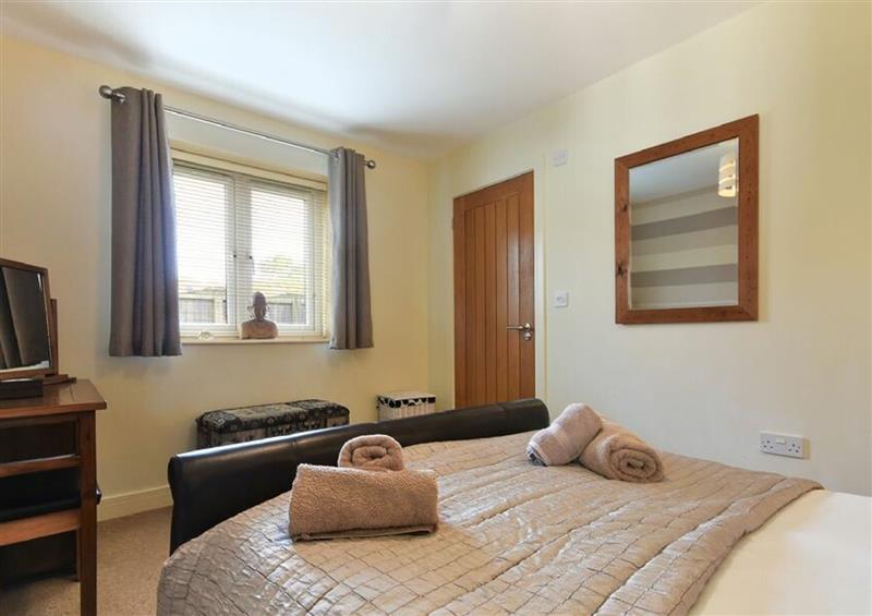This is a bedroom at Assisi Apartment, Alnmouth