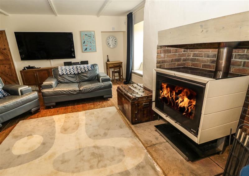 Relax in the living area at Asta Cottage, Cresswell