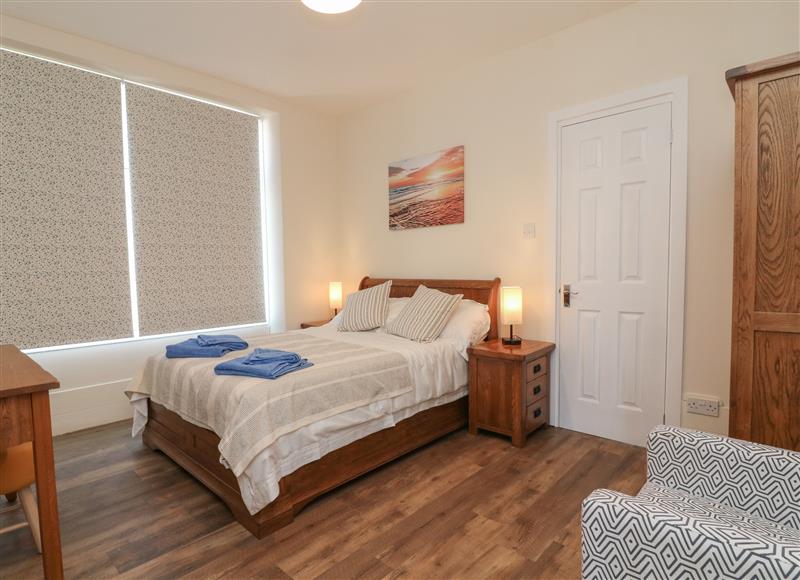This is a bedroom (photo 2) at At the Bay Apartment, Hele Bay