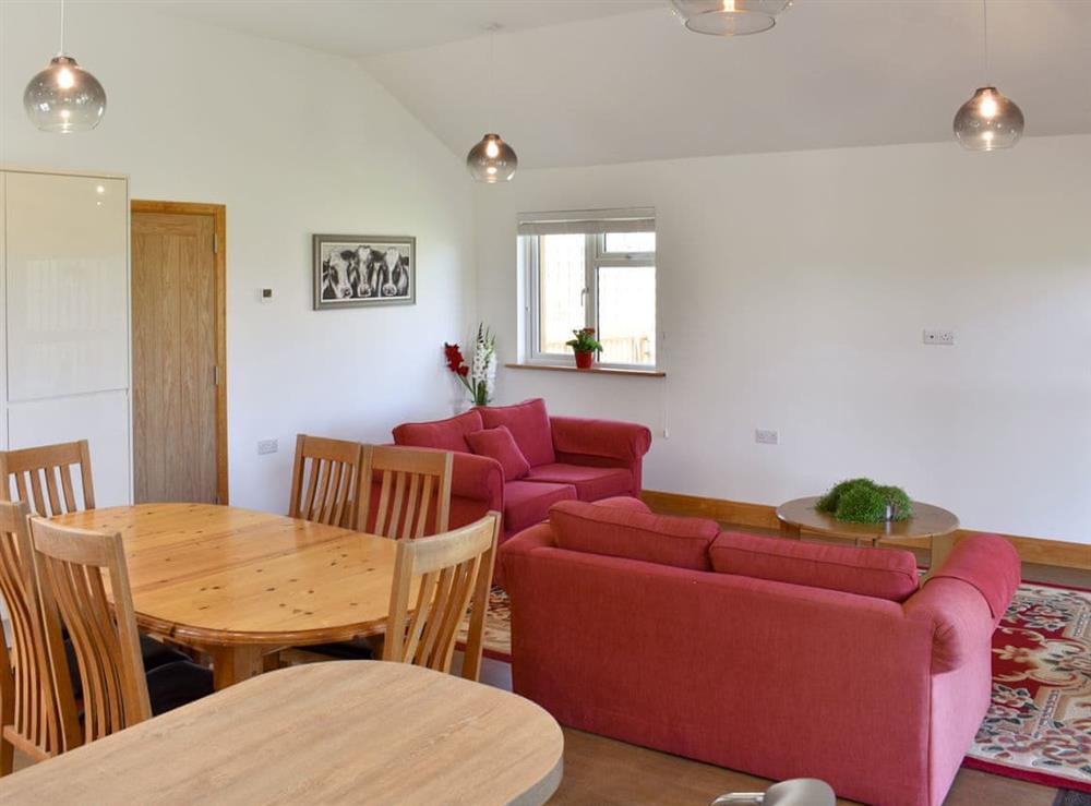 Well presented open plan living space at Wisteria Cottage, 
