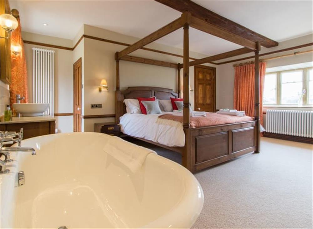 Four Poster bedroom (photo 3) at Atherstone Farm House in Atherstone, Somerset