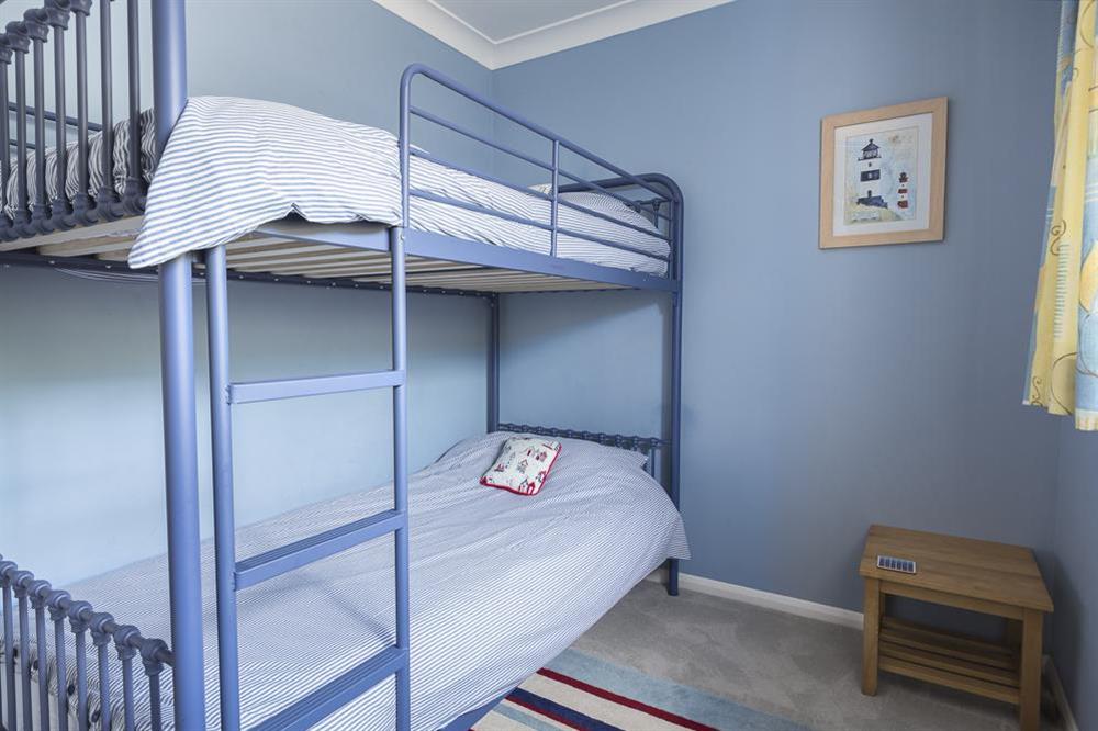A fourth bedroom has a single-above-double bunk-bed fitment at Atlantic Lodge in Hope Cove, Kingsbridge