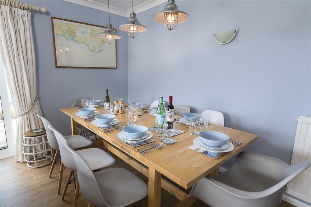 Dining table and eight chairs at Atlantic Lodge in Hope Cove, Kingsbridge