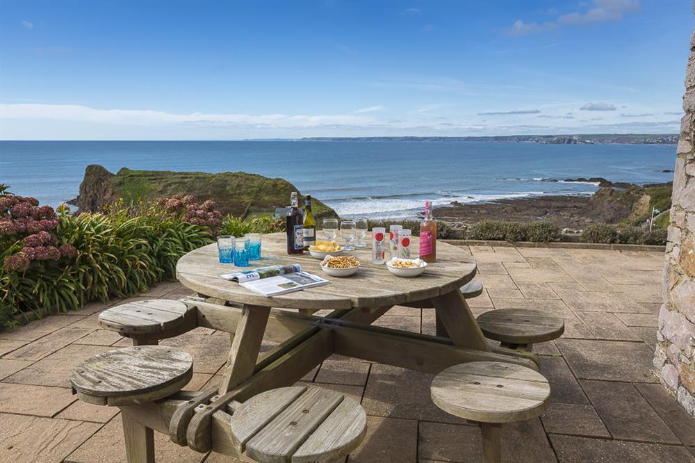 Extensive furnished terrace area offering uninterrupted views out to sea at Atlantic Lodge in Hope Cove, Kingsbridge