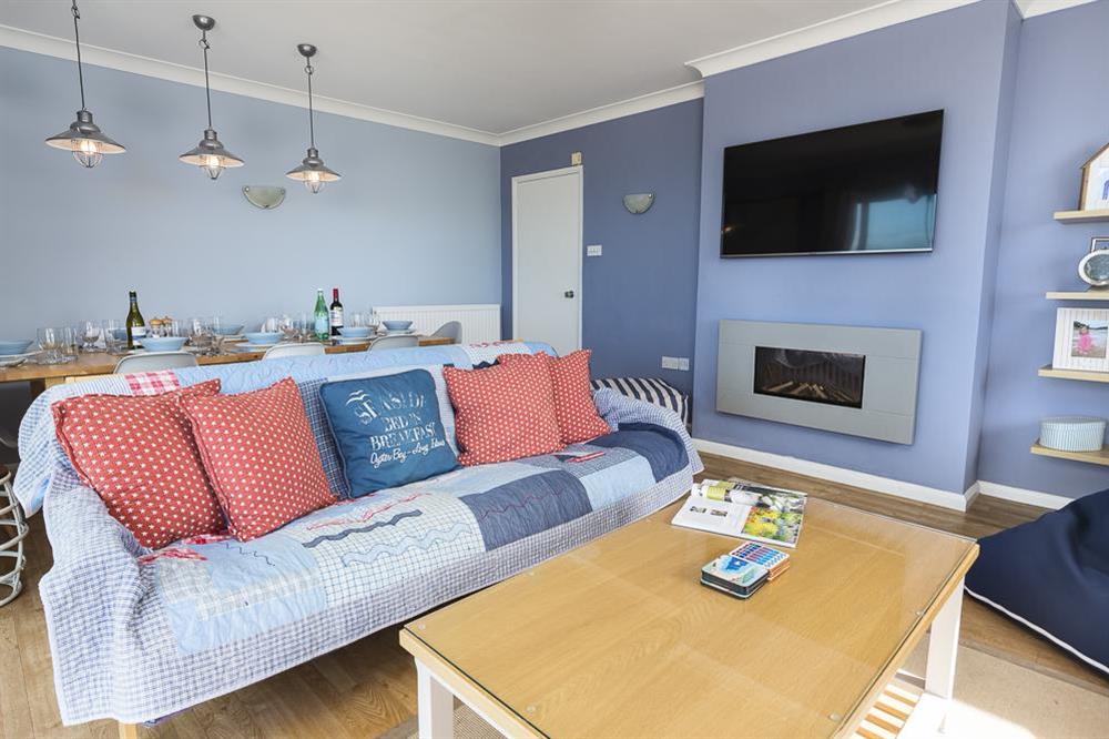 Living room with flat screen TV at Atlantic Lodge in Hope Cove, Kingsbridge