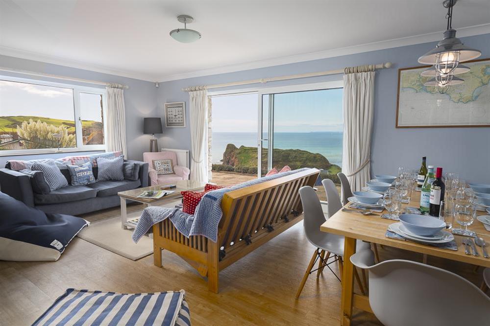 Open plan living and dining area with sea views at Atlantic Lodge in Hope Cove, Kingsbridge