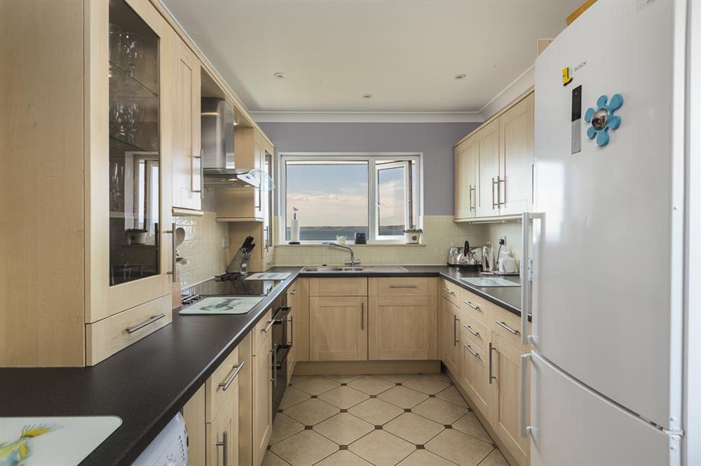 Well equipped kitchen with views over Hope Cove and out to sea at Atlantic Lodge in Hope Cove, Kingsbridge
