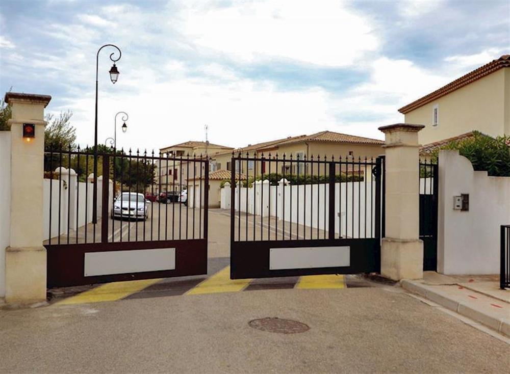 Situated in a private, gated complex