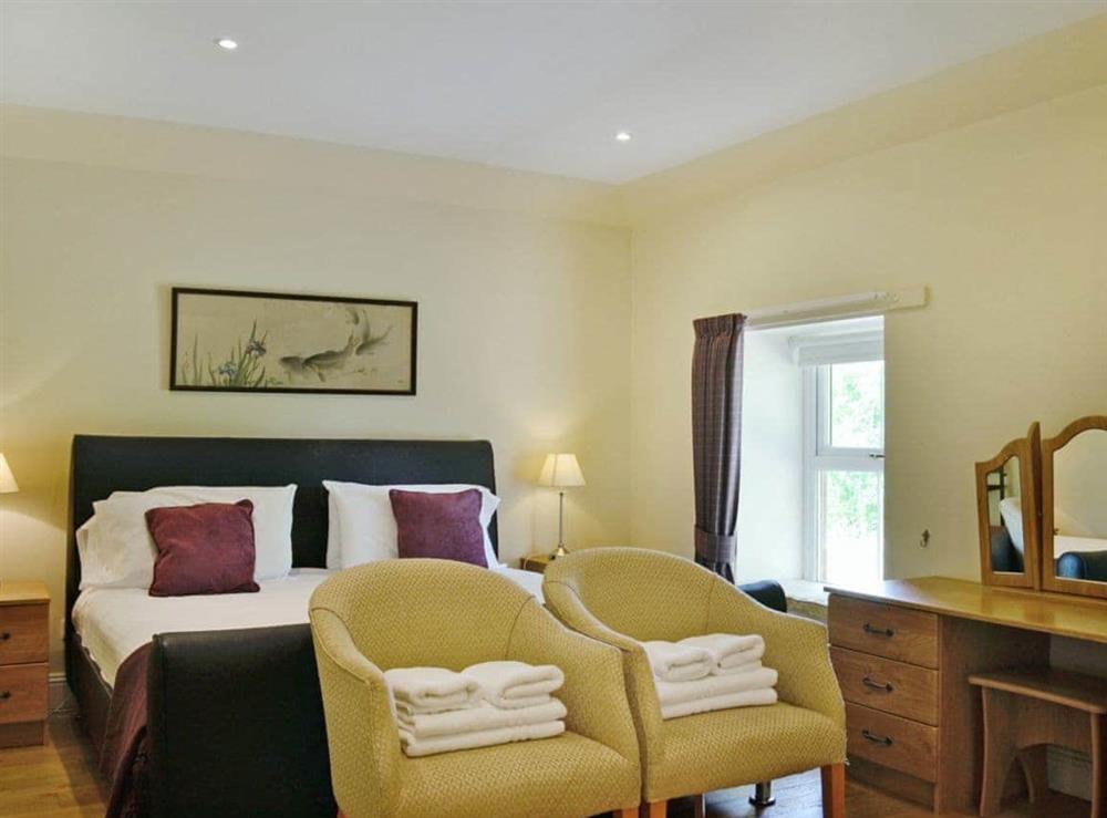 Master bedroom at Auchendennan Farm Cottage in Arden, Alexandria., Dumbartonshire