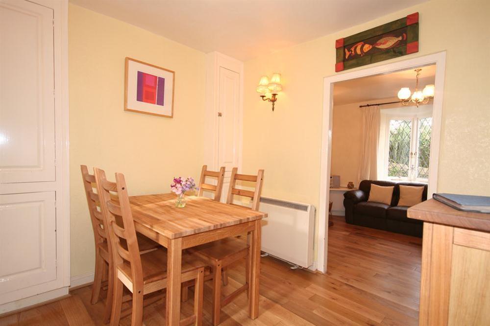 Dining Area with table and four chairs at Aune Cottage in Robinsons Row, Salcombe