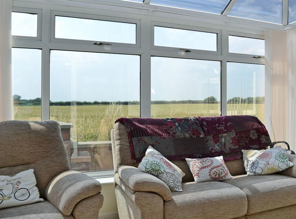 Relaxing conservatory at Authorpe Bungalow in Hogsthorpe, near Skegness, Lincolnshire