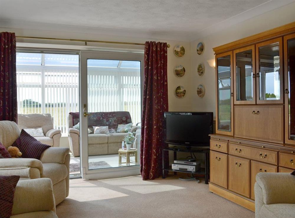 Welcoming living room at Authorpe Bungalow in Hogsthorpe, near Skegness, Lincolnshire