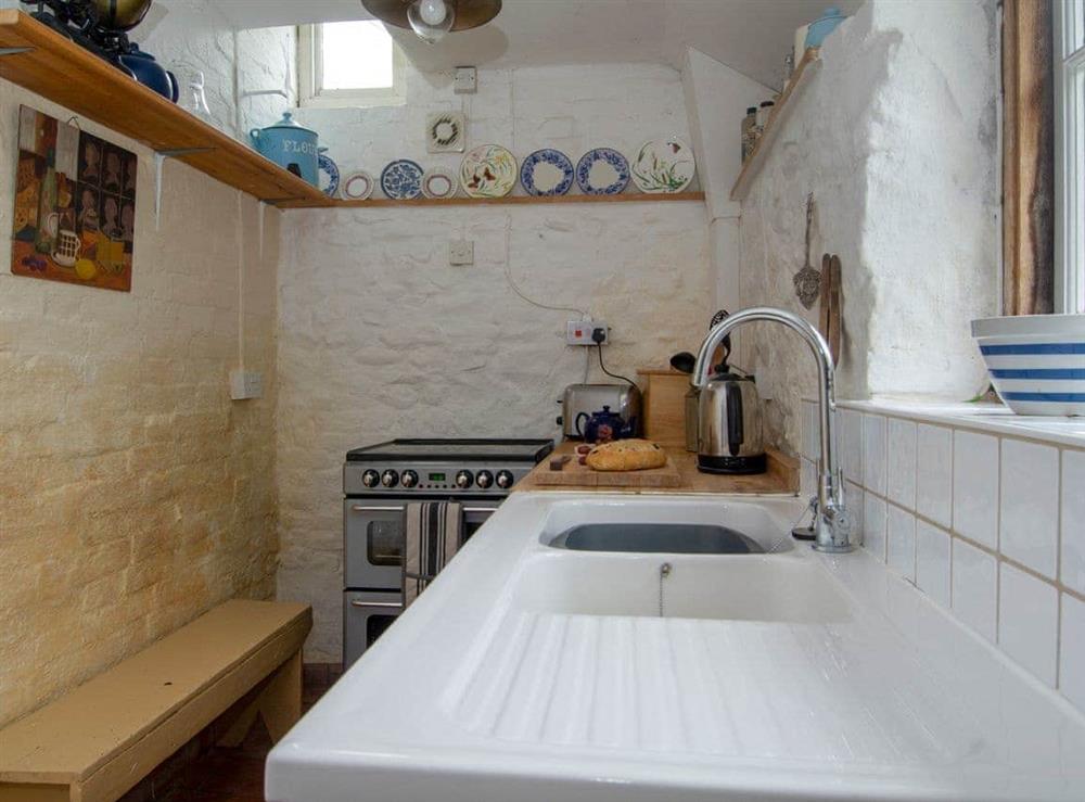 Galley style kitchen (photo 2) at Avebury Cottage in Avebury, Wiltshire