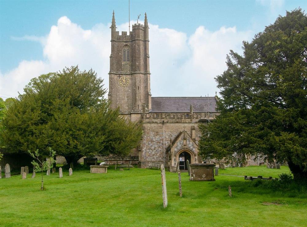 Situated in the churchyard overlooking St James church at Avebury Cottage in Avebury, Wiltshire