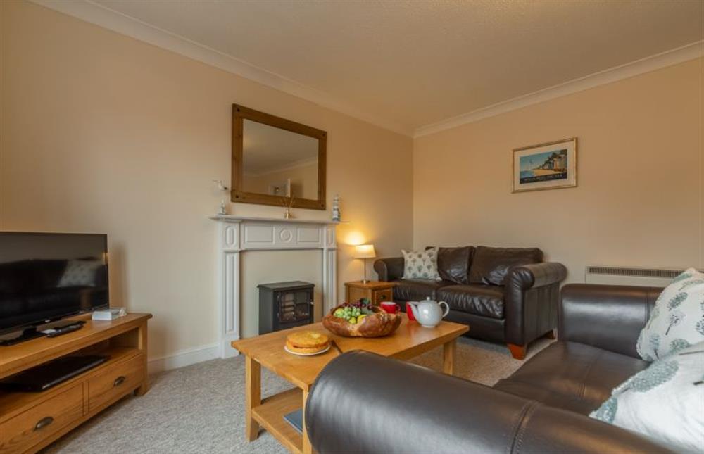 First floor: Comfortable convenient sitting room at Avocet Apartment, Wells-next-the-Sea