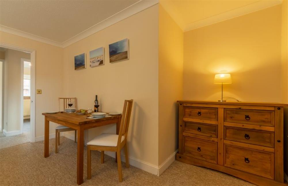 First floor: Dining area looking towards kitchen at Avocet Apartment, Wells-next-the-Sea