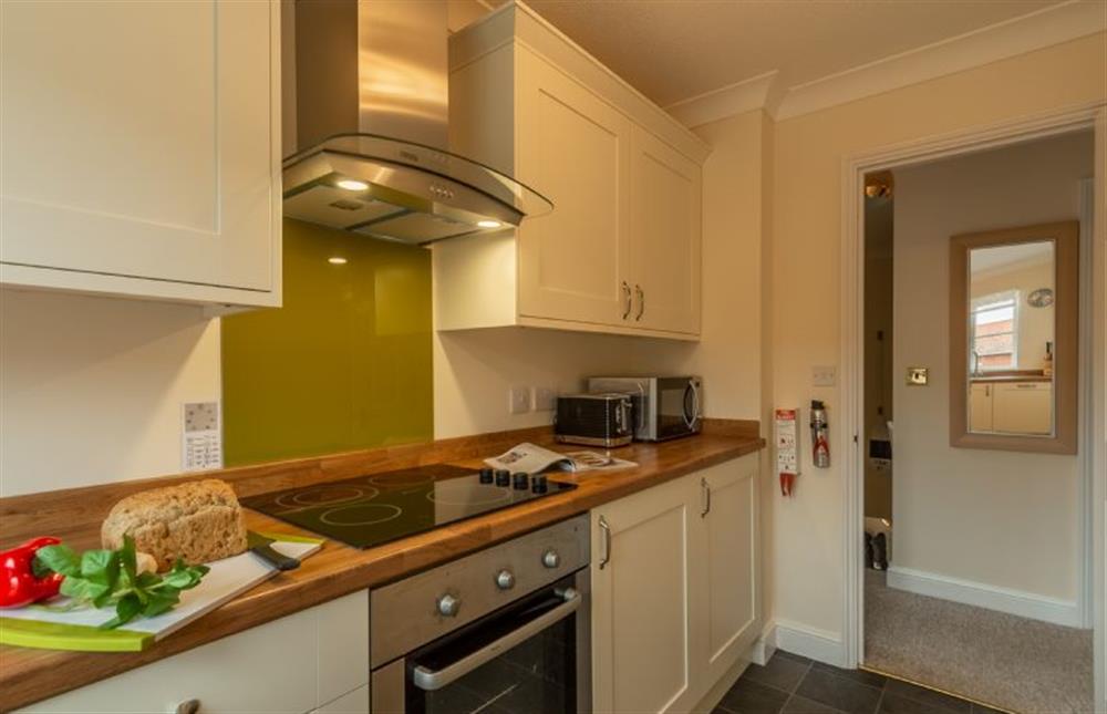First floor: Modern kitchen at Avocet Apartment, Wells-next-the-Sea