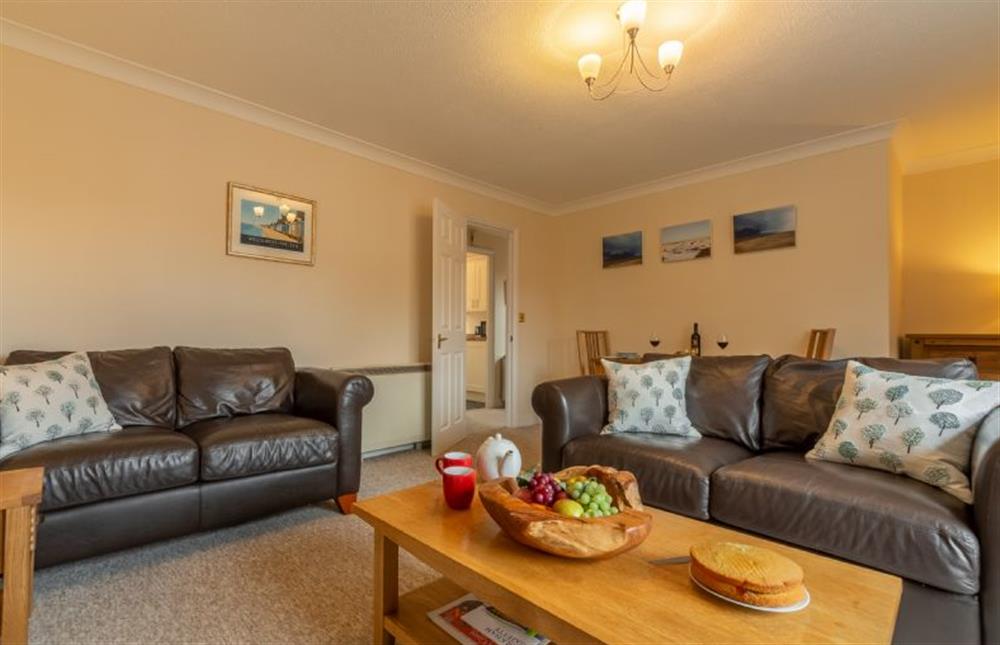 First floor: Spacious sitting room and dining area at Avocet Apartment, Wells-next-the-Sea