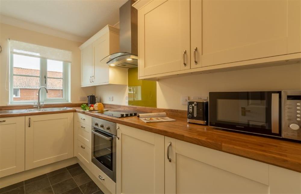 First floor: Well-equipped kitchen at Avocet Apartment, Wells-next-the-Sea