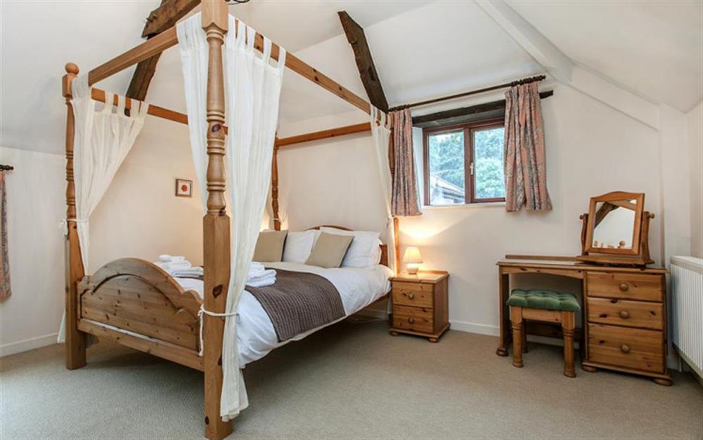 The master bedroom.  at Avon Barn in Diptford