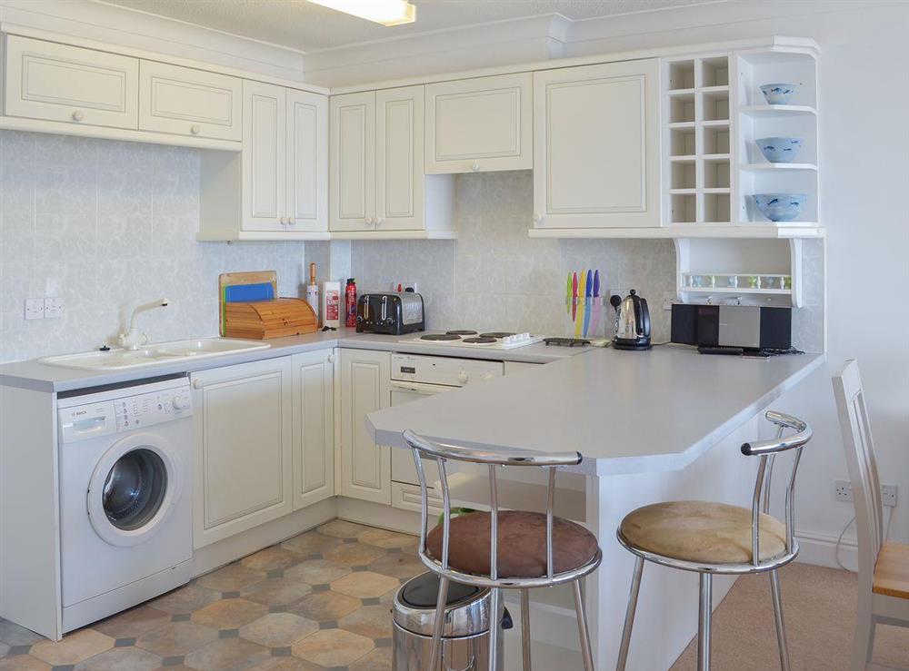 Compact yet well-equipped kitchen at Avon Quillet in Bigbury-on-Sea, Devon