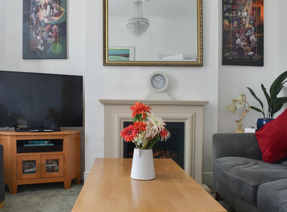 Sitting room with electric fire and Smart TV at Avondale in Clacton on Sea, Essex