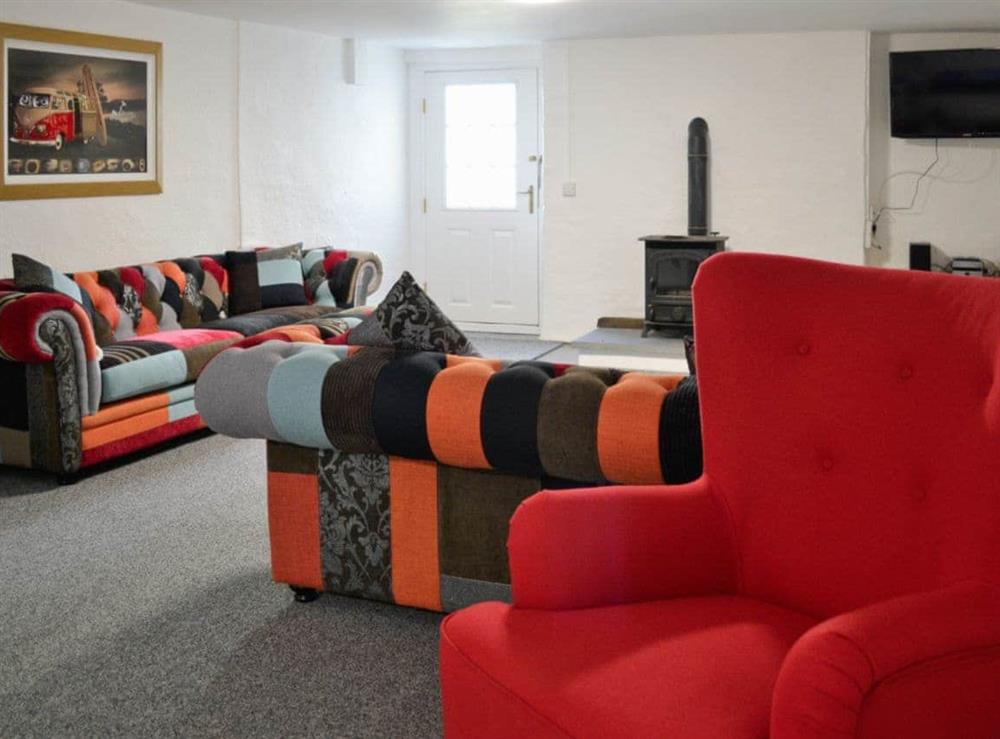 Childrens living room with comfy seating at Awelfa in Aberaeron, Dyfed