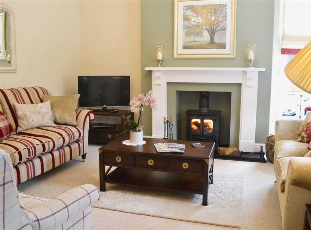 Cosy Living room with comfy sofas and wood-burner at Awelfa in Aberaeron, Dyfed