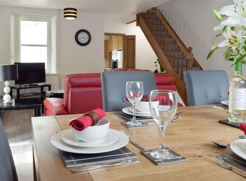 Lovingly furnished living and dining room at Awelfryn in Llandybie, near Llandeilo, Dyfed