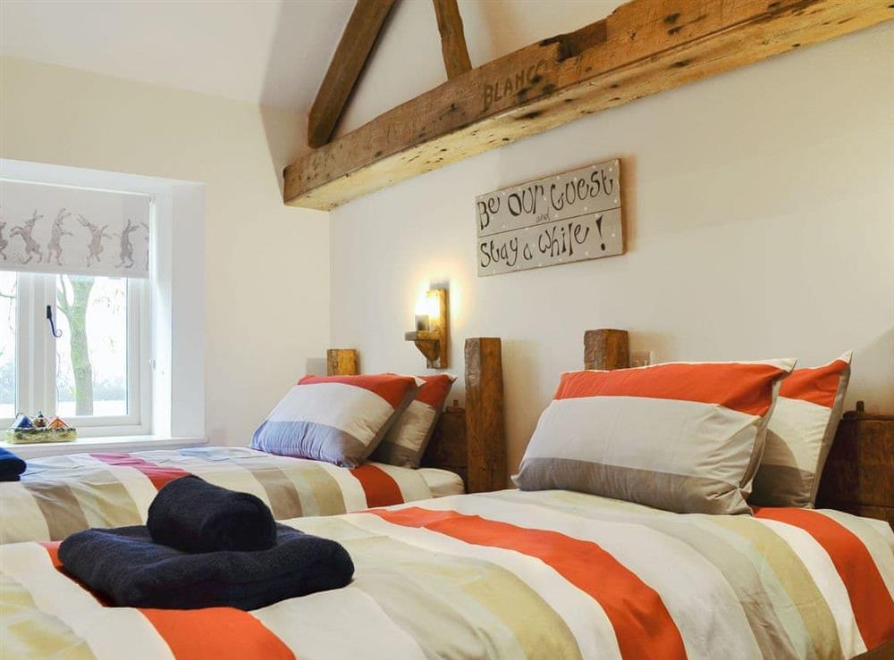 Comfortable twin bedroom at Dringhoe Hall Cottages, 