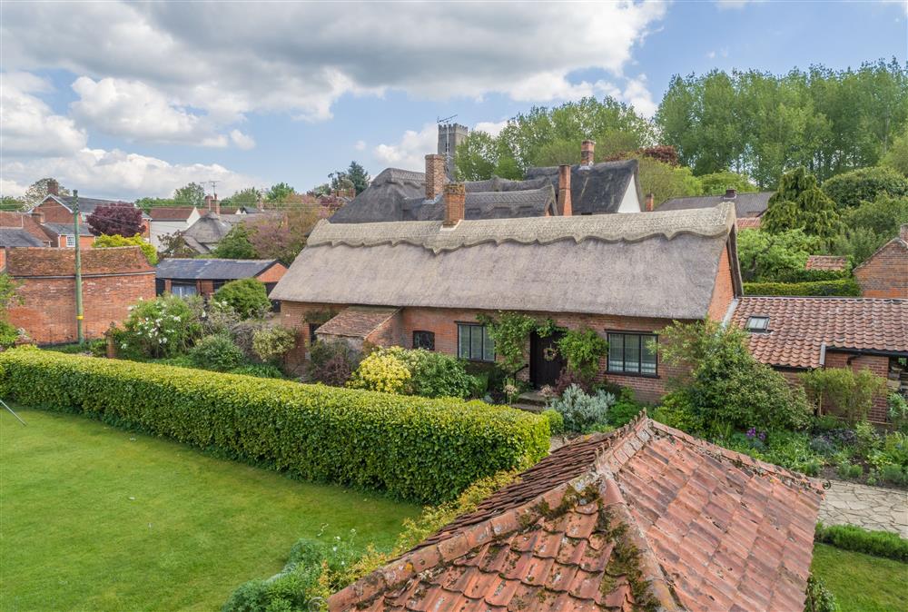 Aerial view of Ayres End Studio, Suffolk, a beautiful thatched cottage in stunning location