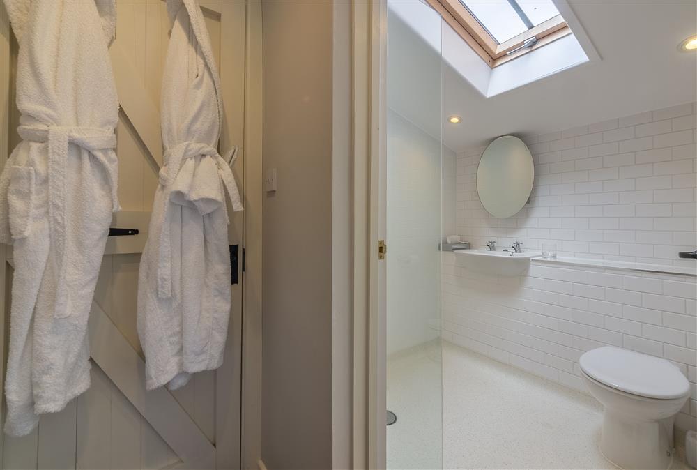 Tiled wet room with shower, wash basin and WC at Ayres End Studio, Kersey