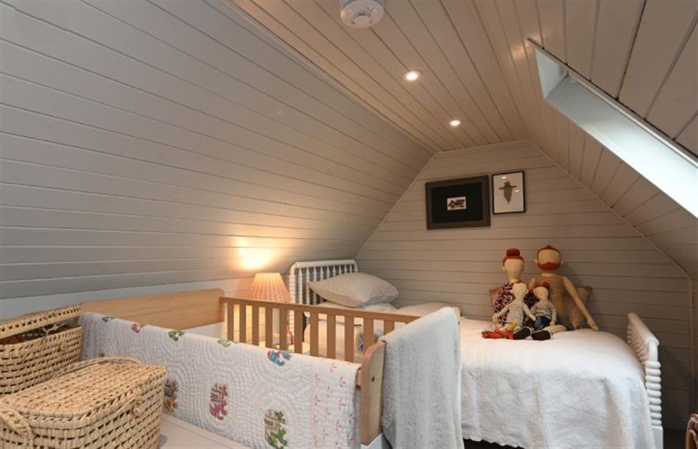 The secret child’s room; bedroom four is charming with a 3’ single bed and one cot at Bachelors Lodge, Sudbury