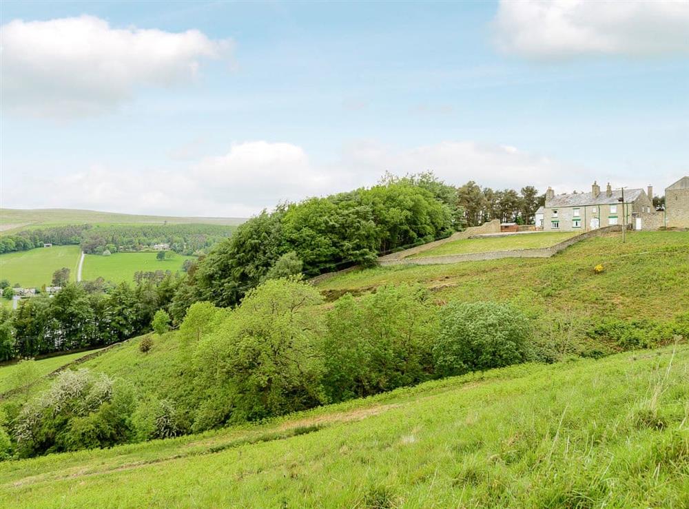 Situated high up on a hill above Tunstall Reservoir at Backstone Bank Farmhouse in Wolsingham, near Stanhope, Durham