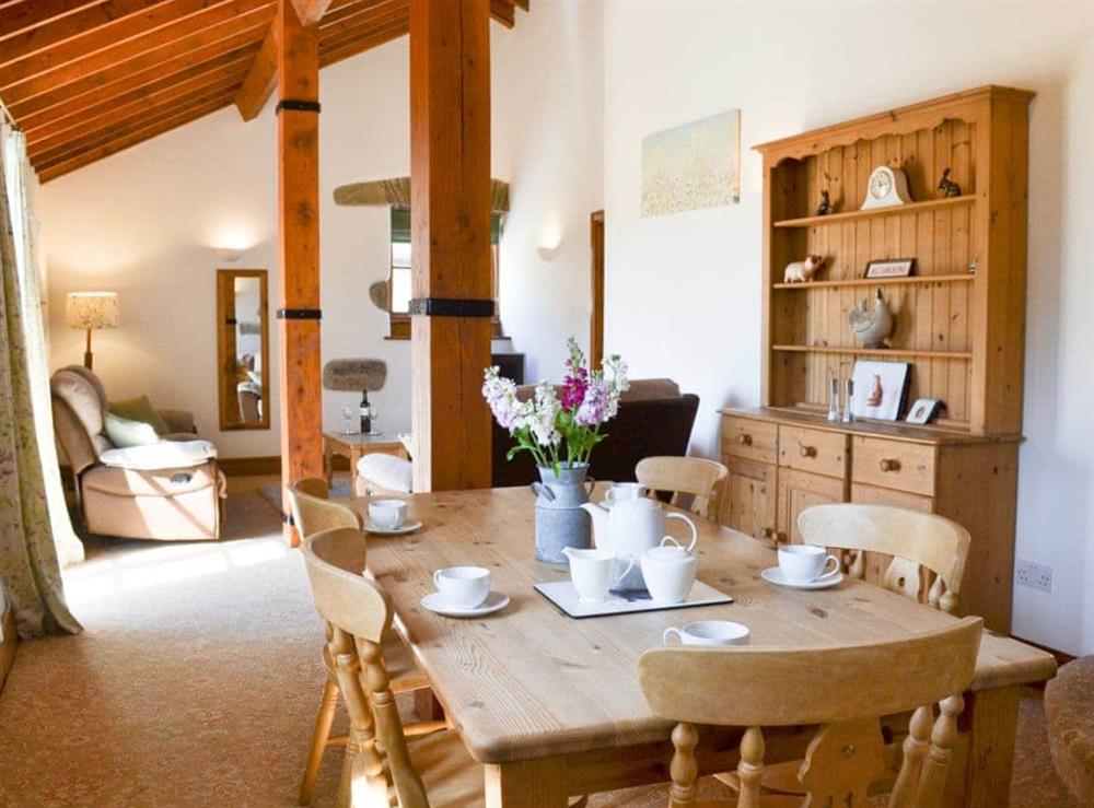 Dining area with traditional furniture at Badger Cottage in Gulworthy, near Tavistock, Devon