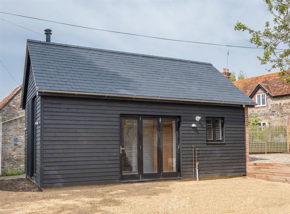 Attractive holiday home with bi-fold doors at Badgers Brook in Brook, near Brighstone, Isle of Wight