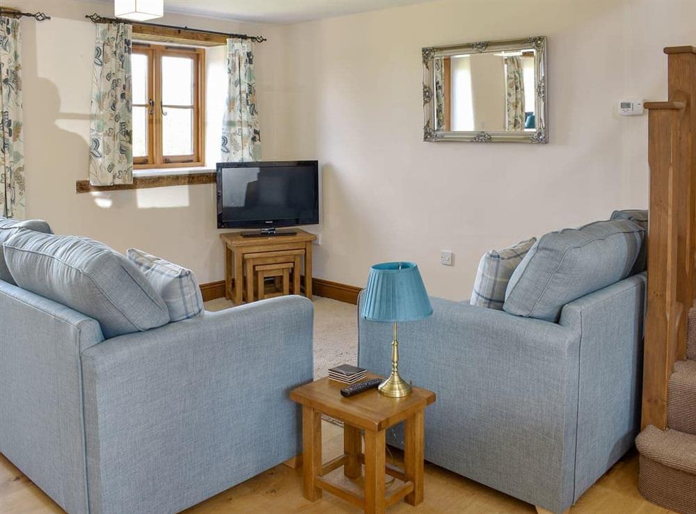 Comfortable open plan living space at Jolliffe, 
