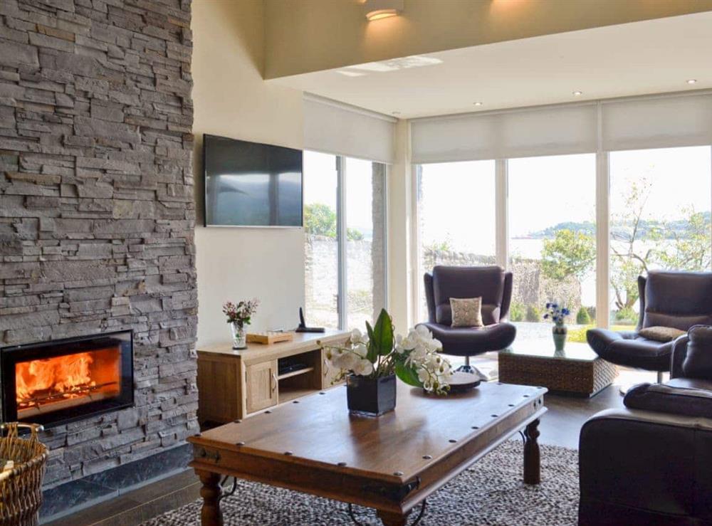 Fantastic living room with floor-to-ceiling windows and panoramic views at Baileyfield in Strone, near Dunoon, Argyll
