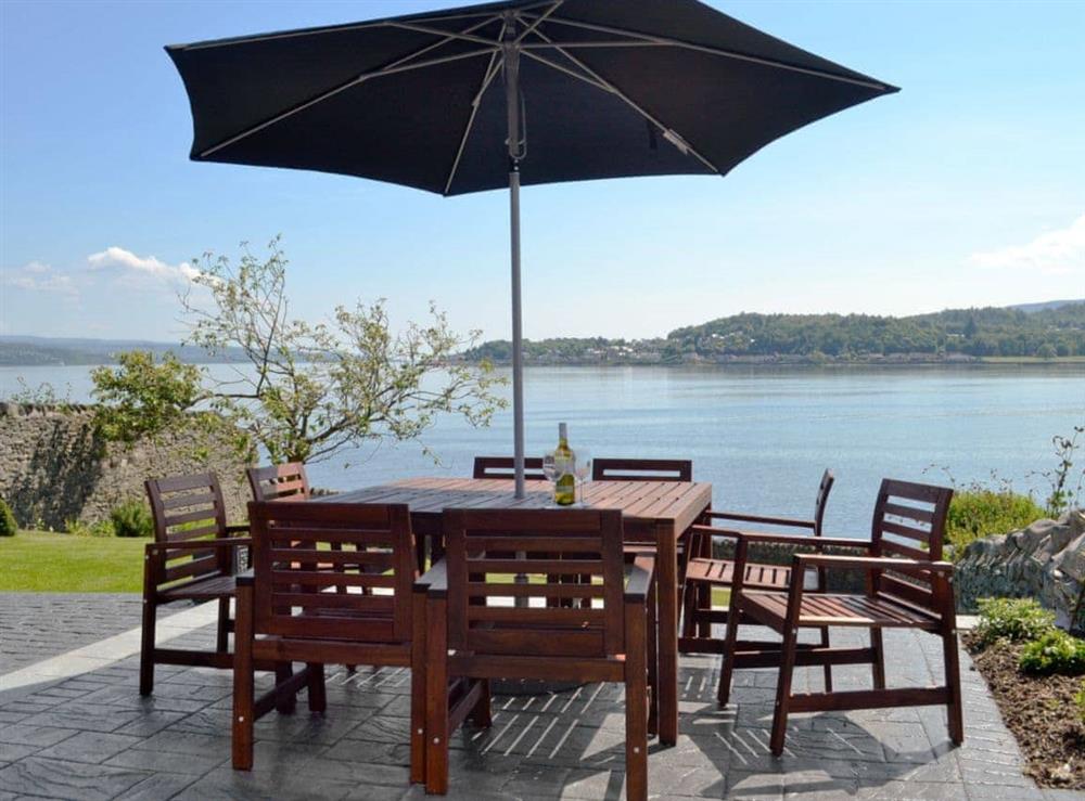 Outdoor eating area with stunning views of the Loch at Baileyfield in Strone, near Dunoon, Argyll