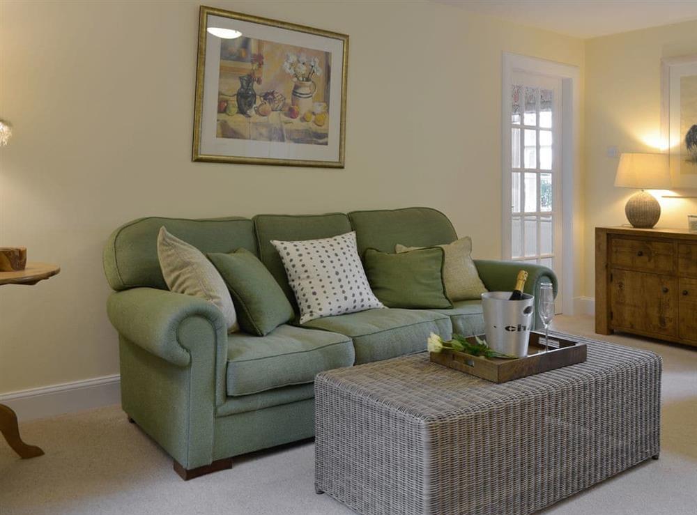Comfortable seating within living room at Baldowrie Gate Lodge in Kettins, near Blairgowrie, Perthshire
